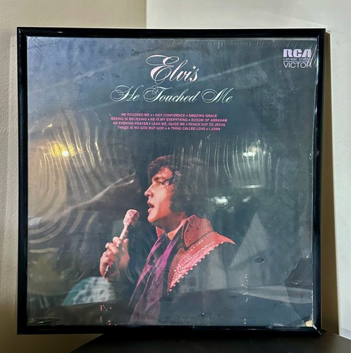 Mint sealed framed elvis - &,